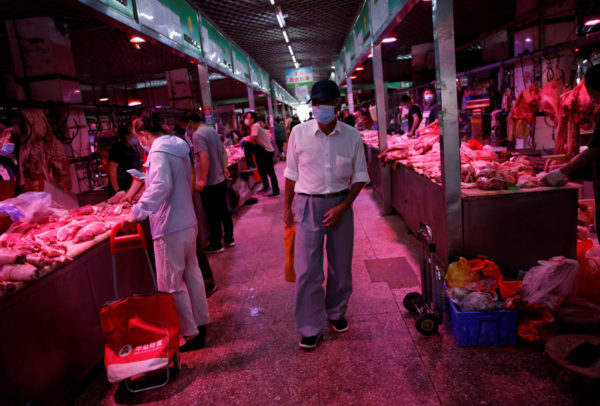Pekín detecta coronavirus en mercado de carnes, pescados y mariscos